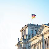 German flag on the Reichstag, Berlin. Bram@Unsplash
