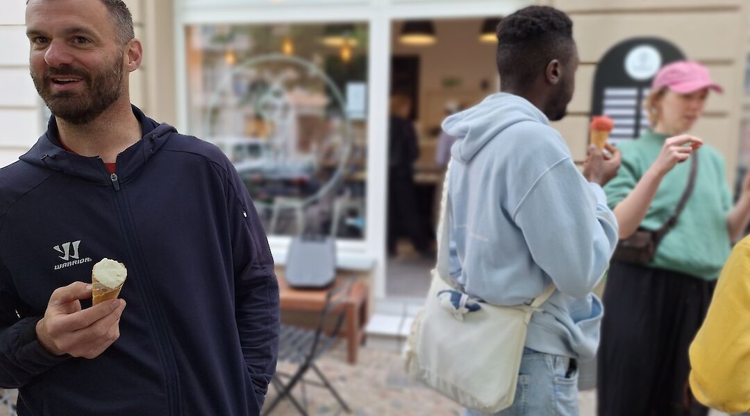 Tasting local ice cream on the Berlin bike tour, Germany. CC:TO