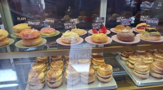 Visiting a local donut shop on the Berlin bike tour, Germany. CC:TO