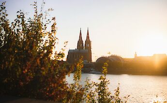 Cologne skyline at sunset, Germany. Unsplash:Keanu K