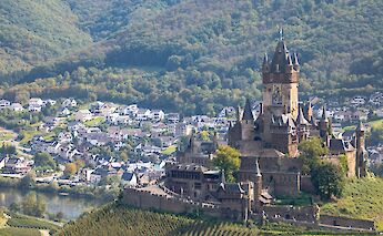 Reichsburg Castle with Cochem in the background, Germany. Unsplash:Gruescu Ovidiu