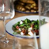 Octopus and salad dish. Unsplash:Caroline Attwood