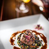 Meat and lentils with wine. Unsplash:Getty Images