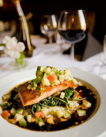 Salmon and vegetables with wine. Unsplash:Casey Lee