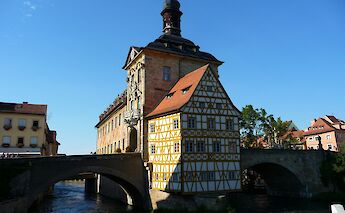 Blue skies over bridges in Bamberg, Germany. Unsplash:Sarah Borkner