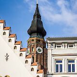 Church tower, Straubing, Germany. Unsplash:Leonhard Niederwimmer