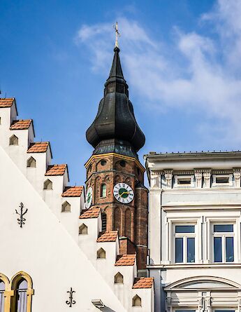 Church tower, Straubing, Germany. Unsplash:Leonhard Niederwimmer