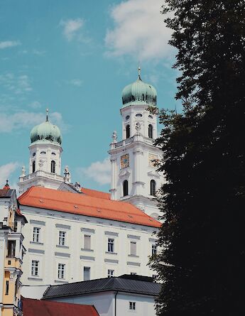 Clouds and blue sky above Passau, Germany. Unsplash:Yves Cedric Schulze