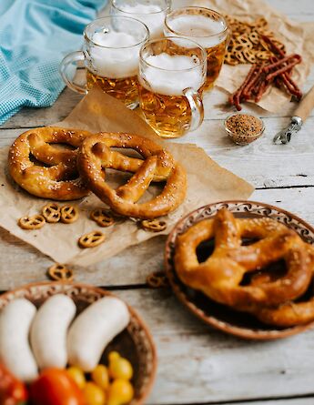 German pretzels and beer. Unsplash:Kateryna Hliznitsova
