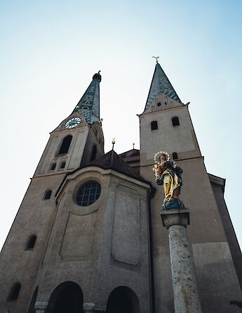 Looking up at a church in Beilngries, Germany. Unsplash:Markus Spiske