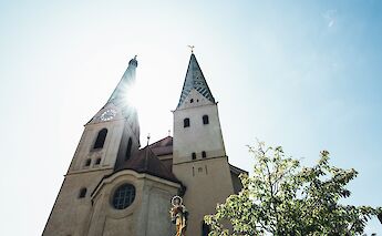 Sunlight through the church towers, Beilngries, Germany. Unsplash:Markus Spiske
