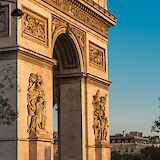 Arc de Triomphe at dusk, Paris, France. Unsplash:Arthur Humeau