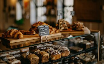 An assortment of pastries displayed in a Parisian bakery.