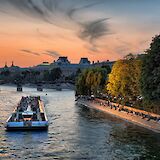 Boat on the River Seine at sunset, Paris, France. Unsplash:Joe Desousa
