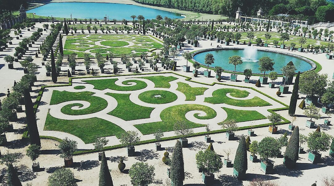 Patterned gardens of Versailles, France. Unsplash:Hailey Wagner