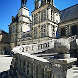 Steps outside the castle, Fontainebleau, France. Unsplash:Chantal Garnier