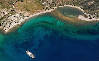 Boat in a bay, Leros Island, Greece. CC:Island Hopping