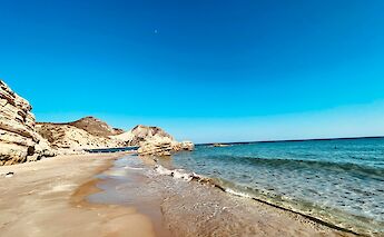 Golden sand beach on the Island of Kos, Greece. Unsplash:Christian Klose