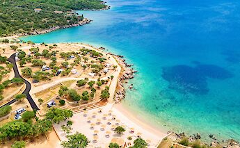 Campsite on Pag, Croatia. Unsplash:HLS 44
