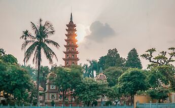 Temple at dusk, Hanoi, Vietnam. Unsplash:Hoang Anh