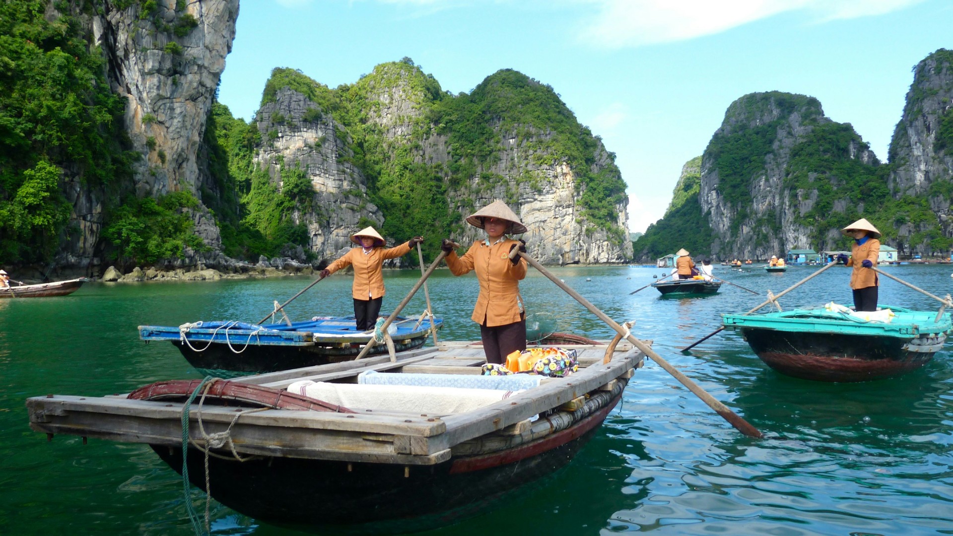 Traditional boats in Ha Long Bay, Vietnam. Unsplash:Gary Cacciatore