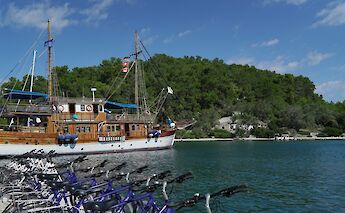Bikes in a line next to the Panagiota. CC:Tobias Lohmann