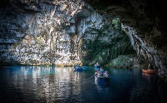 Boats in a cave. CC:Tobias Wenkemann