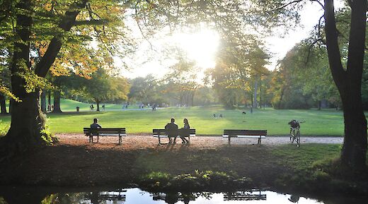 People sitting in the English garden, Munich, Germany. I do nothing but love@Unsplash