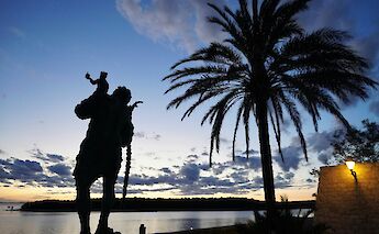Sunset at a statue on Rab, Croatia. Unsplash:Peter Burdon