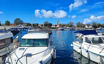 White boats in Zadar, Croatia. Unsplash:Kristina Kutlesa