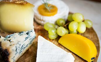 Cheese and fruit selection. Unsplash:Curated Lifestyle