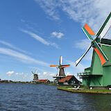 Row of windmills at Zaanse Schans, Holland. Unsplash:Enes Dincer