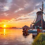 Zaanse Schans sunset, Holland. Unsplash:Getty Images