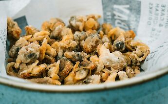 Delicious fried cockels along the Welsh coast. MattSeymour@unsplash