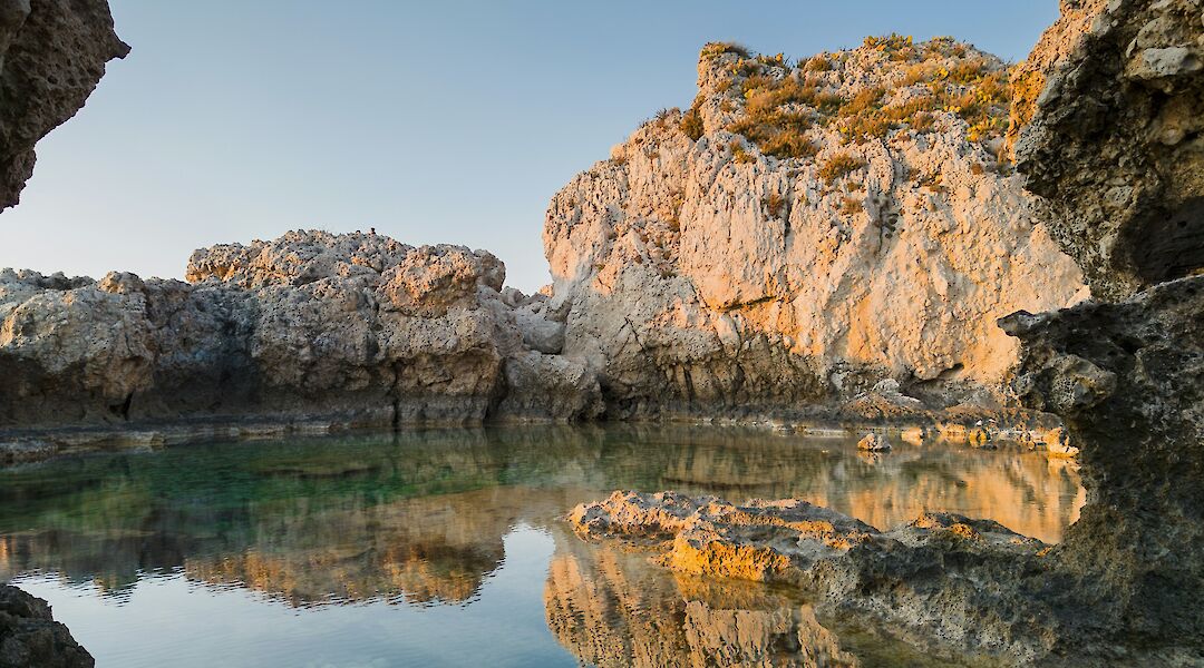Natural pool in Milazzo, Italy. Unsplash:Giuseppe Famiani