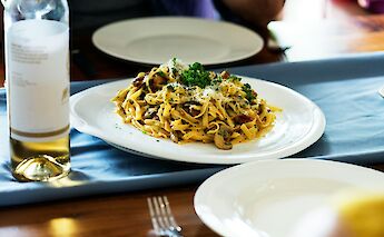 Pasta with wine. Unsplash:Curated Lifestyle