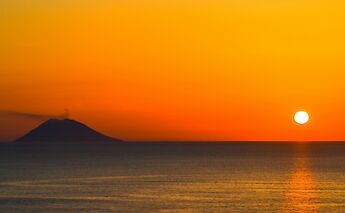 Sunset on Stromboli, Italy. Unsplash:Serena Repice Lentini