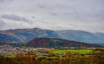 Scotland's highlands seen from the defensive wall of the Stirling Castle. Quick PS@Unsplash
