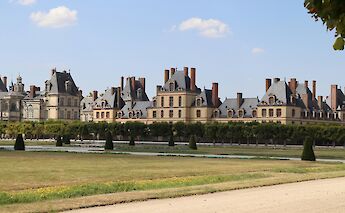 Palace of Fontainebleau from a distance, France. Unsplash:Isaac Arnault