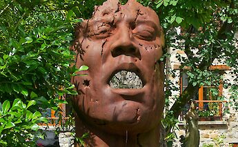 Sculpture on the Grande Rue, Barbizon, France. Unsplash:Pascal Bernardon