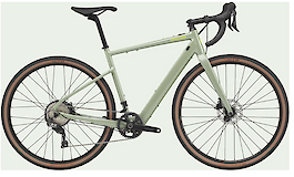 A light green electric gravel bike with a drop handlebar and brown sidewall tires, offering a combination of speed and comfort.