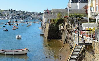 Low tide in classic Cornish harbor town. To-Cco
