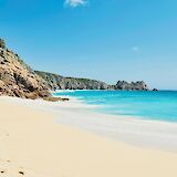 The turquoise waters of Porthcurno Beach, Cornwall.  Benjamin Elliott@unsplash