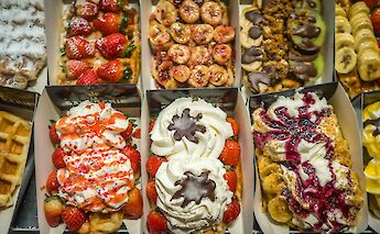 A colorful dsplay of Belgian waffles. Alexander Schimmeck@unsplash