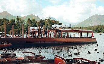 Classic wooden launch boats. MarioTuzon@unsplash