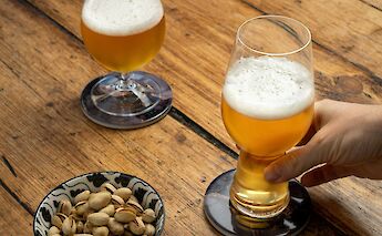 Craft beer and pistachios. James McGraw@Unsplash