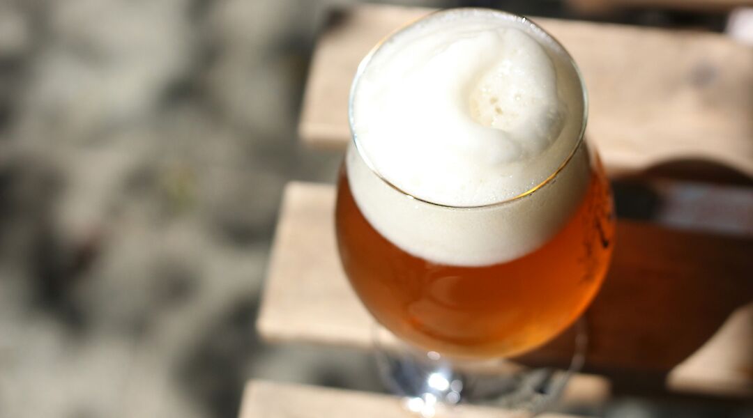 Craft beer on a table. Monica Diloxley@Unsplash