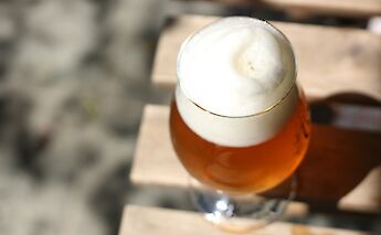 Craft beer on a table. Monica Diloxley@Unsplash