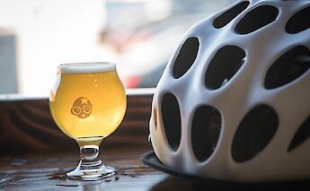 Craft beer and bike helmet, Oklahoma City, Oklahoma, USA. CC:Ride OKC