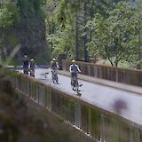 Biking on a bridge, Multnomah Falls, Oregon, USA. CC:Ebike Multnomah Falls